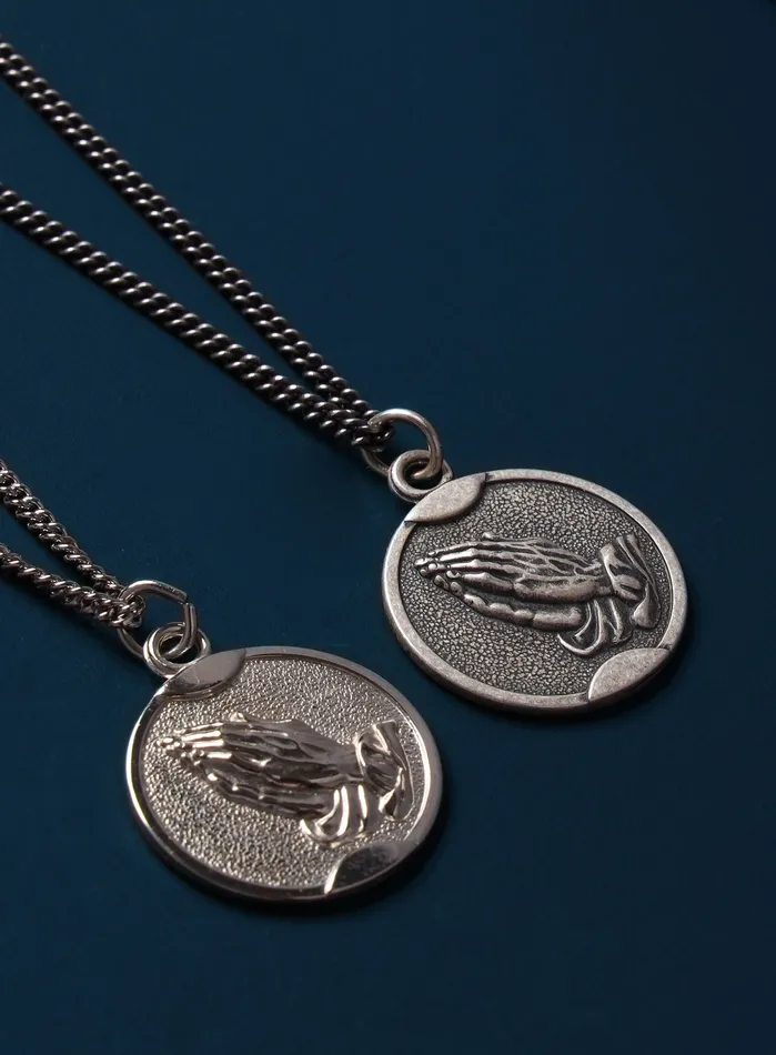 WE ARE ALL SMITH Necklaces Praying Hands Round Sterling Silver Medal Necklace