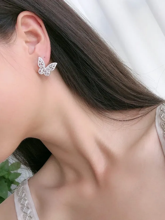 Yellow Chimes Earrings for Women and Girls White Stud Earrings for Women Silver Toned Crystal Butterfly Shaped Stud Earrings Birthday Gift for girls and women Anniversary Gift for Wife Yellow Chimes Necklaces