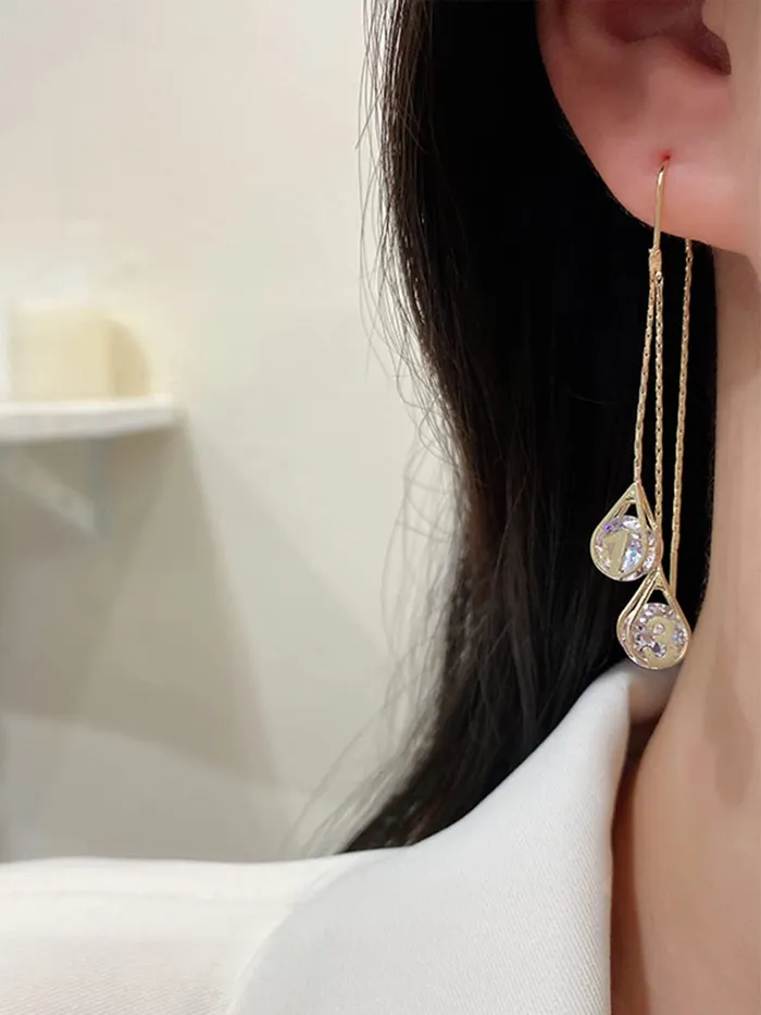 Yellow Chimes Earrings For Women Gold Toned Crystal Studded Tear Drop Shape Chain Tassel Dangler Earrings For Women and Girls Yellow Chimes Necklaces