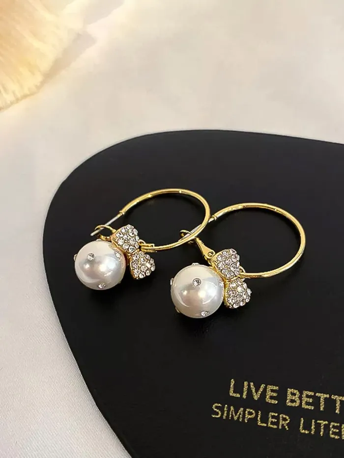 Yellow Chimes Earrings For Women Gold Toned Open Circle Hoop With Crystal Studded Butterfly Round Pearl Hanging Drop Earrings For Women and Girls Yellow Chimes Necklaces