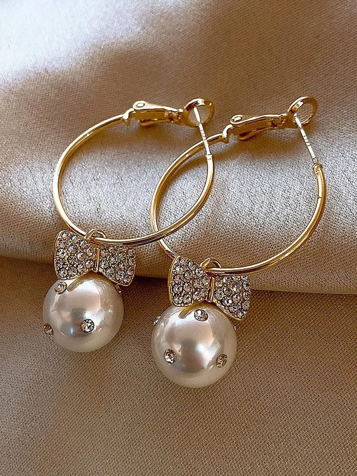 Yellow Chimes Earrings For Women Gold Toned Open Circle Hoop With Crystal Studded Butterfly Round Pearl Hanging Drop Earrings For Women and Girls Yellow Chimes Necklaces