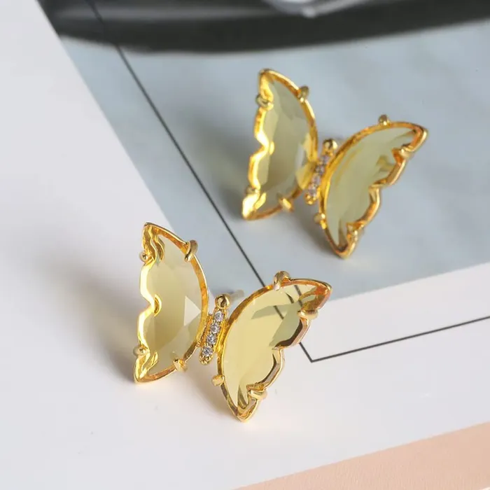 Yellow Chimes Elegant Latest Fashion Gold Plated Yellow Studded Crystal Butterfly Shaped Stud Earrings for Women and Girls Yellow Chimes Necklaces