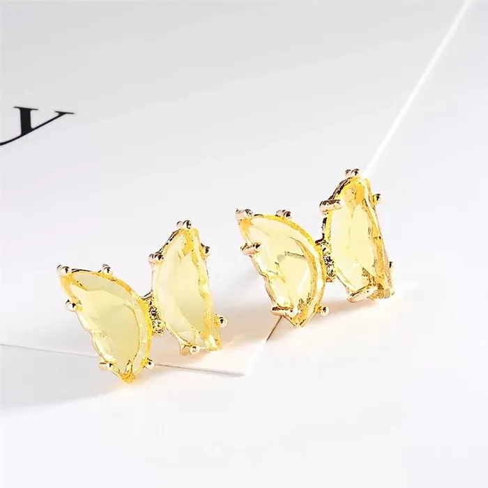 Yellow Chimes Elegant Latest Fashion Gold Plated Yellow Studded Crystal Butterfly Shaped Stud Earrings for Women and Girls Yellow Chimes Necklaces