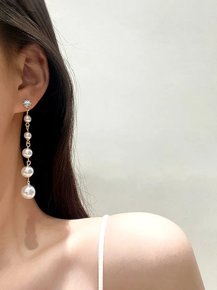 Yellow Chimes White Danglers Earrings for Women Pearl Earrings for Girls Gold Plated Fashion Women Earrings Long Chain Dangler Earrings Birthday Gift For Girls Anniversary Gift for Wife Yellow Chimes Necklaces